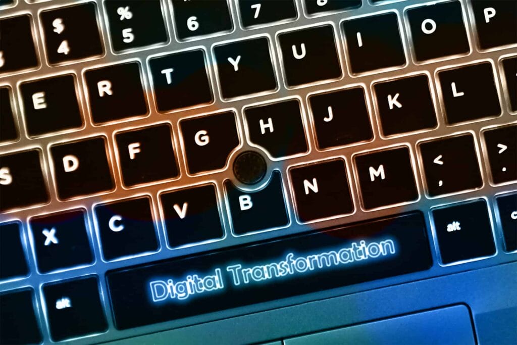 a keyboard with the word digital transformation